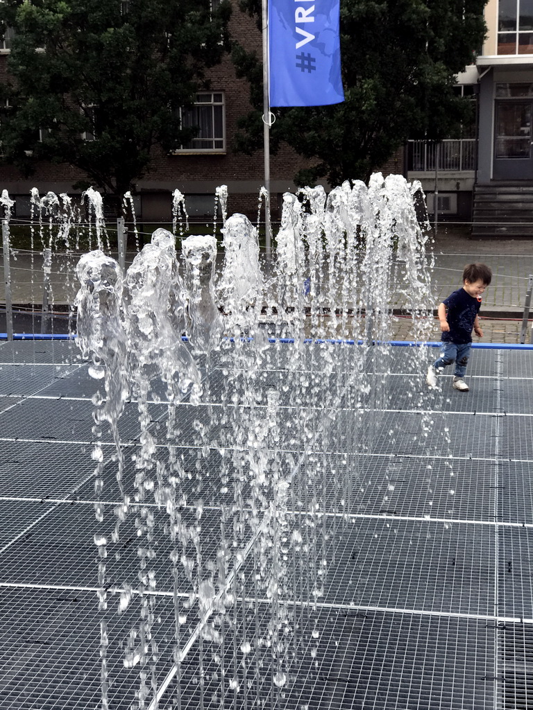 Max at the Peace Fountain at the Kasteelplein square