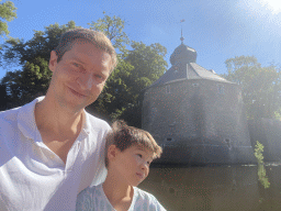 Tim and Max on our tour boat at the Nieuwe Mark river, with a view on the Spanjaardsgat gate