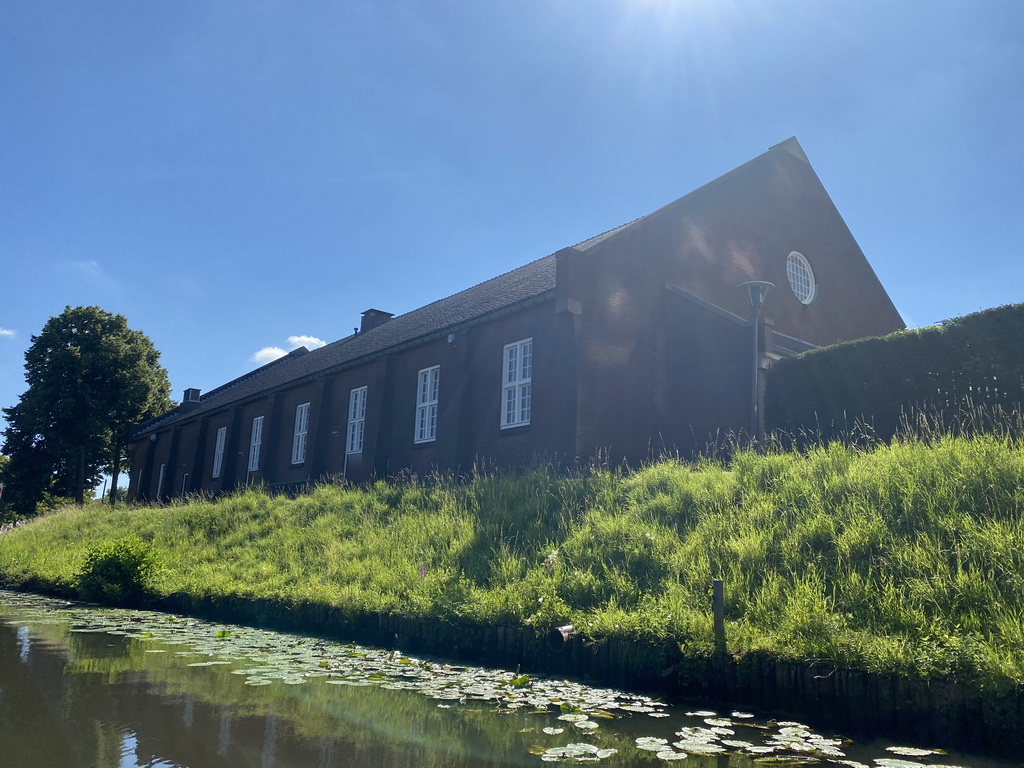 The Mark river and a building of the Royal Military Academy at the Kraanstraat street, viewed from our tour boat