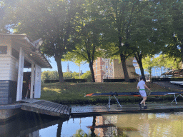 The Mark river, a building of the Cadetten Roei- en Zeilvereniging Dudok Van Heel association, a building of the Royal Military Academy and the Grote Kerk church, viewed from our tour boat