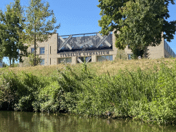 The Mark river and the front of the Stedelijk Gymnasium Breda highschool at the Nassausingel street, viewed from our tour boat