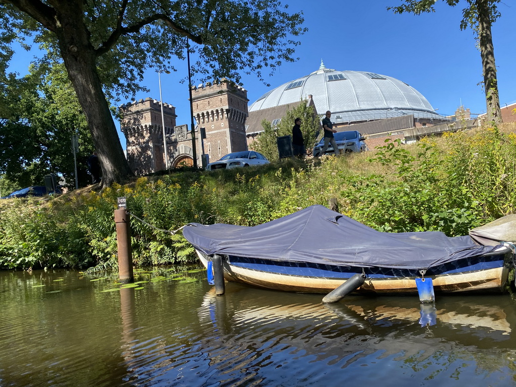 Boat on the Mark river and the front of the Koepelgevangenis building at the Nassausingel street, viewed from our tour boat