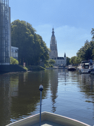 Boats on the Nieuwe Mark river, the former Post Office and the Grote Kerk church, viewed from our tour boat