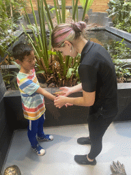 Max`s friend and a zookeeper with an Australian Walking Stick at the lower floor of the Reptielenhuis De Aarde zoo