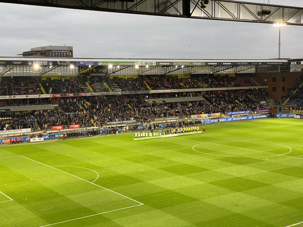 Players lining up on the field of the Rat Verlegh Stadium, just before the match NAC Breda - FC Den Bosch