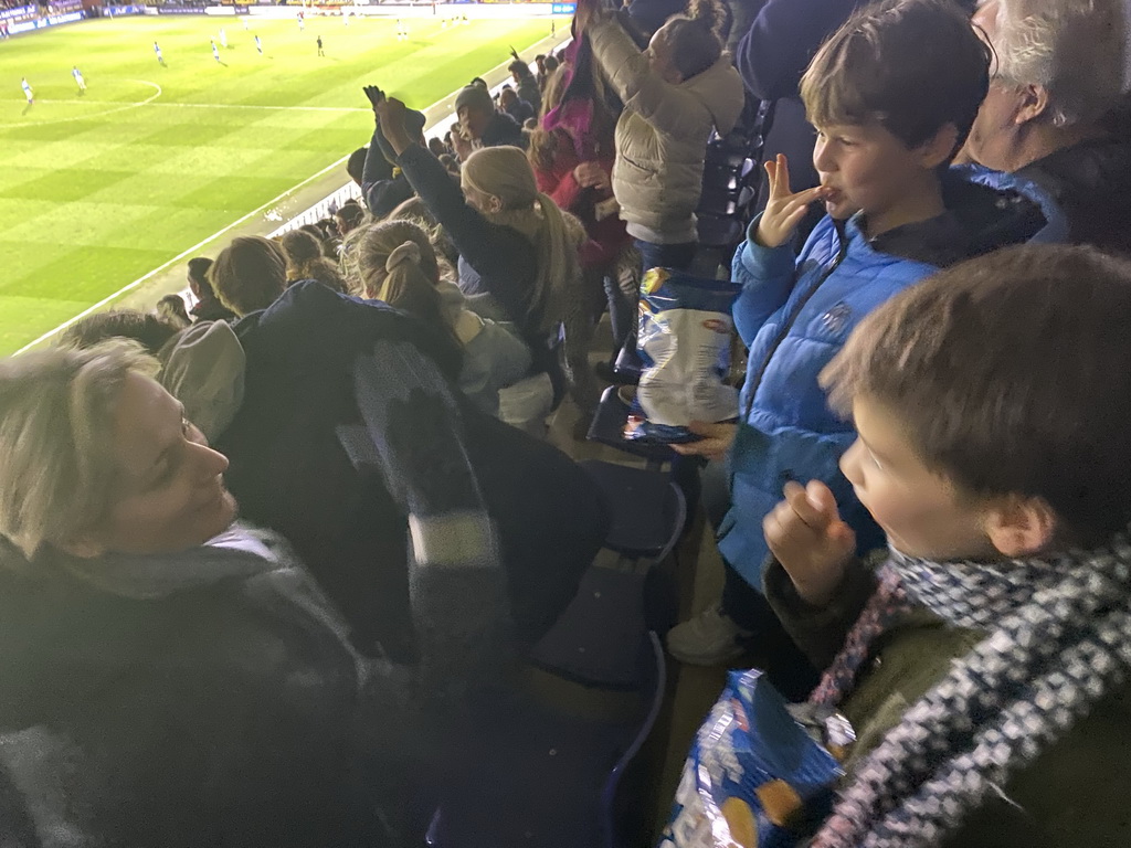 Max and his friend celebrating the first goal of NAC Breda at the F9 grandstand of the Rat Verlegh Stadium, with a view on the field, during the match NAC Breda - FC Den Bosch