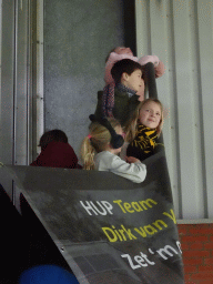 Max and his friends with a banner from school at the F9 grandstand of the Rat Verlegh Stadium, during the match NAC Breda - FC Den Bosch