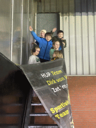 Max and his friends with a banner from school at the F9 grandstand of the Rat Verlegh Stadium, during the match NAC Breda - FC Den Bosch