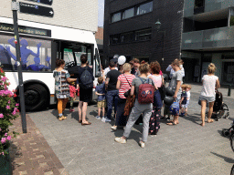 People in front of the `Vervelende Bus` of the Peuterfestival in front of the Breda Library at the Oude Vest street