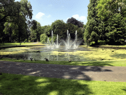 Fountain, geese and ducks at the Stadspark Valkenberg