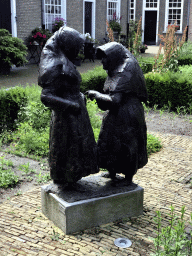 Statue `Begijnen` at the southwest side of the Begijnhof garden