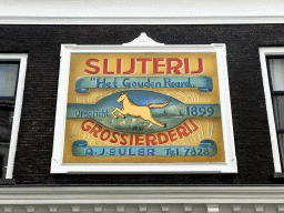 Old sign at the facade of the IJssalon Toetie Froetie shop at the Reigerstraat street