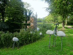 Flamingo statues at the northeast side of the gardens of Bouvigne Castle