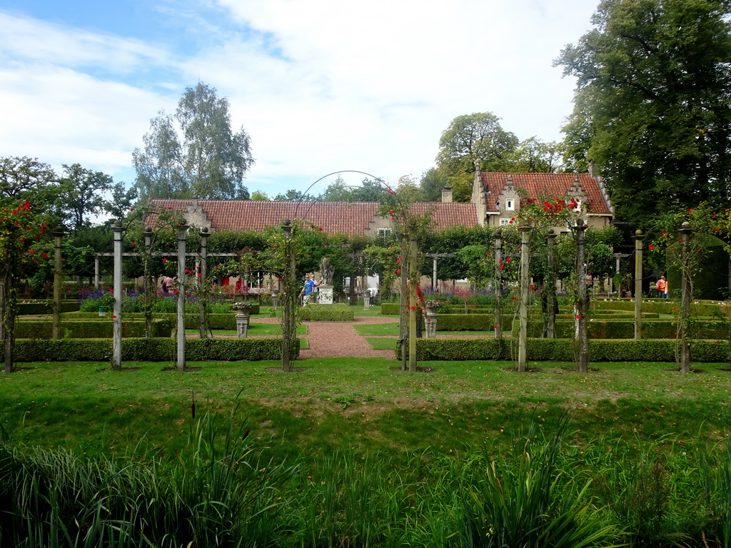 The French Garden and the Koetshuis and Poortgebouw buildings of Bouvigne Castle, viewed from the English Garden
