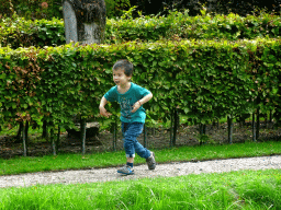 Max at the English Garden of Bouvigne Castle, viewed from the French Garden