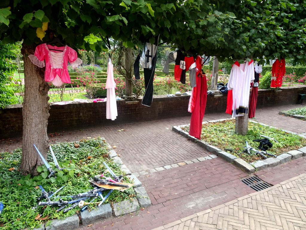 Clothes and toy swords in front of the Koetshuis building of Bouvigne Castle
