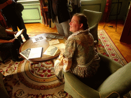 Person dressed in traditional clothing at the southwest room of Bouvigne Castle