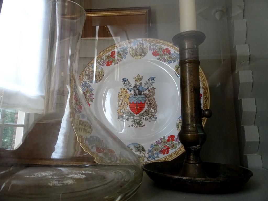 Vase, plate and candleholder in a closet at the southeast room of Bouvigne Castle