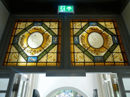 Stained glass windows above the entrance of Bouvigne Castle