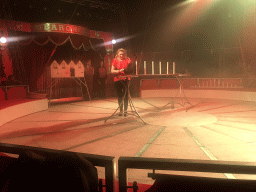 Animal trainer with a cat at Circus Barones, during the show