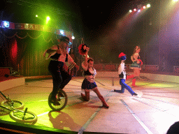 Cyclist and dancer at Circus Barones, during the show