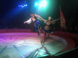 Cyclist and dancer at Circus Barones, during the show