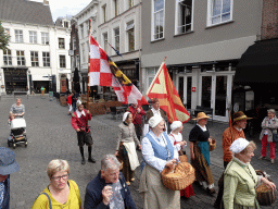 Flag bearers and other actors at the north side of the Grote Markt Square, during the Nassaudag