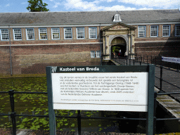 Front with the Stadtholder`s Gate, southern bridge and information on the Breda Castle at the Kasteelplein square