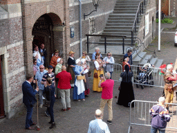 Musicians and other actors at the Parade square of Breda Castle, viewed from the staircase to the Blokhuis building, during the Nassaudag