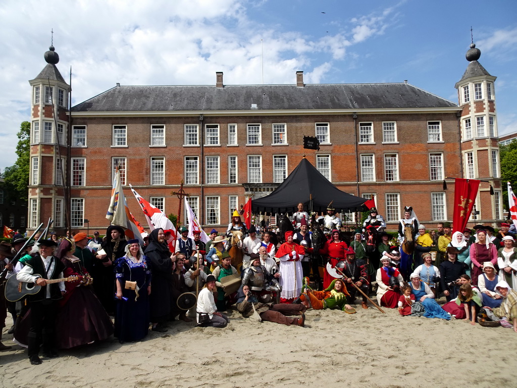 Jester, flag bearers, musicians, monks, knights, horses and other actors at the Parade square in front of the Main Building of Breda Castle, during the Nassaudag