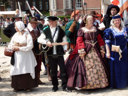 Musicians and other actors at the Parade square in front of the Main Building of Breda Castle, during the Nassaudag