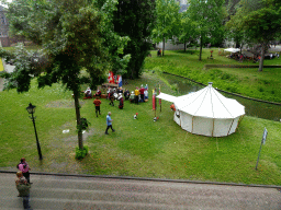 The Mark river, tent and actors at the southwest side of Breda Castle, viewed from the First Floor of the Main Building, during the Nassaudag