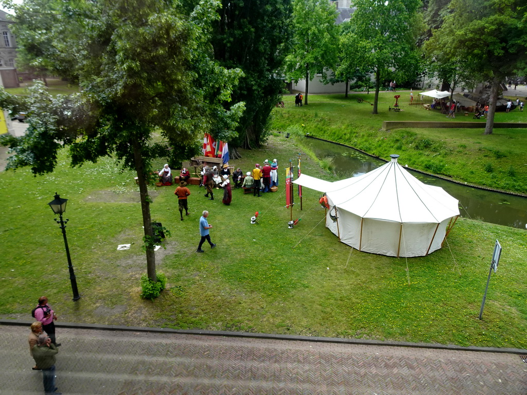 The Mark river, tent and actors at the southwest side of Breda Castle, viewed from the First Floor of the Main Building, during the Nassaudag