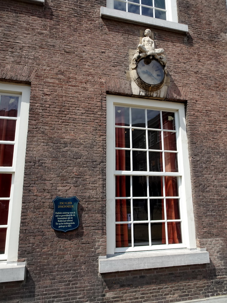 Clock and information on the Stairs of Honor at the Inner Square of Breda Castle