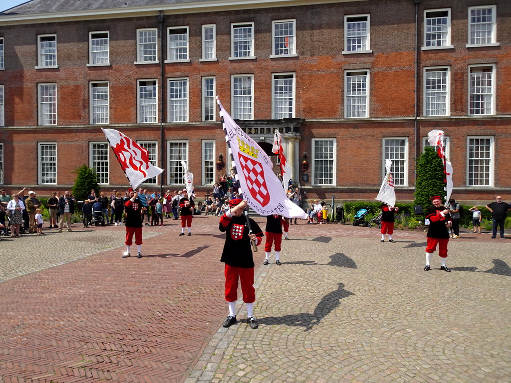 Flag bearers at the Parade square in front of the Main Building of Breda Castle, during the Nassaudag