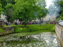 The Mark river, cannons being shot and the Spanjaardsgat gate, viewed from the southern bridge of Breda Castle, during the Nassaudag