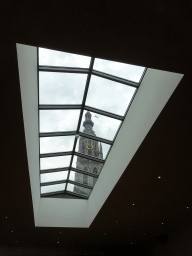 The tower of the Grote Kerk church, viewed through the roof of the Foodhall Breda