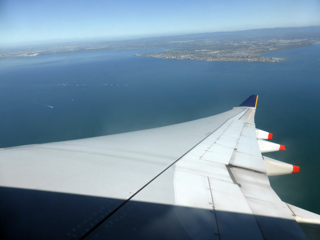 The towns of Scarborough, Newport, Redcliffe, Margate and Woody Point, the Houghton Highway bridge over Bramble Bay and the Hays Inlet Conservation Park, viewed from the airplane from Singapore