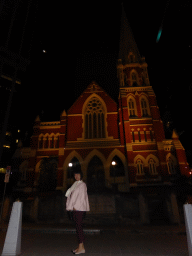 Miaomiao in front of the Albert Street Uniting Church at Albert Street, by night