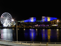 The Brisbane River, the Wheel of Brisbane and the Queensland Performing Arts Centre, viewed from William Street, by night