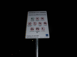 Sign at Wickham Park, by night