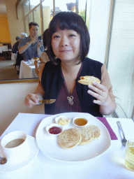 Miaomiao having breakfast in the Soho Motel