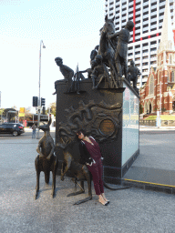 Miaomiao in front of the Petrie Tableau monument at the King George Square