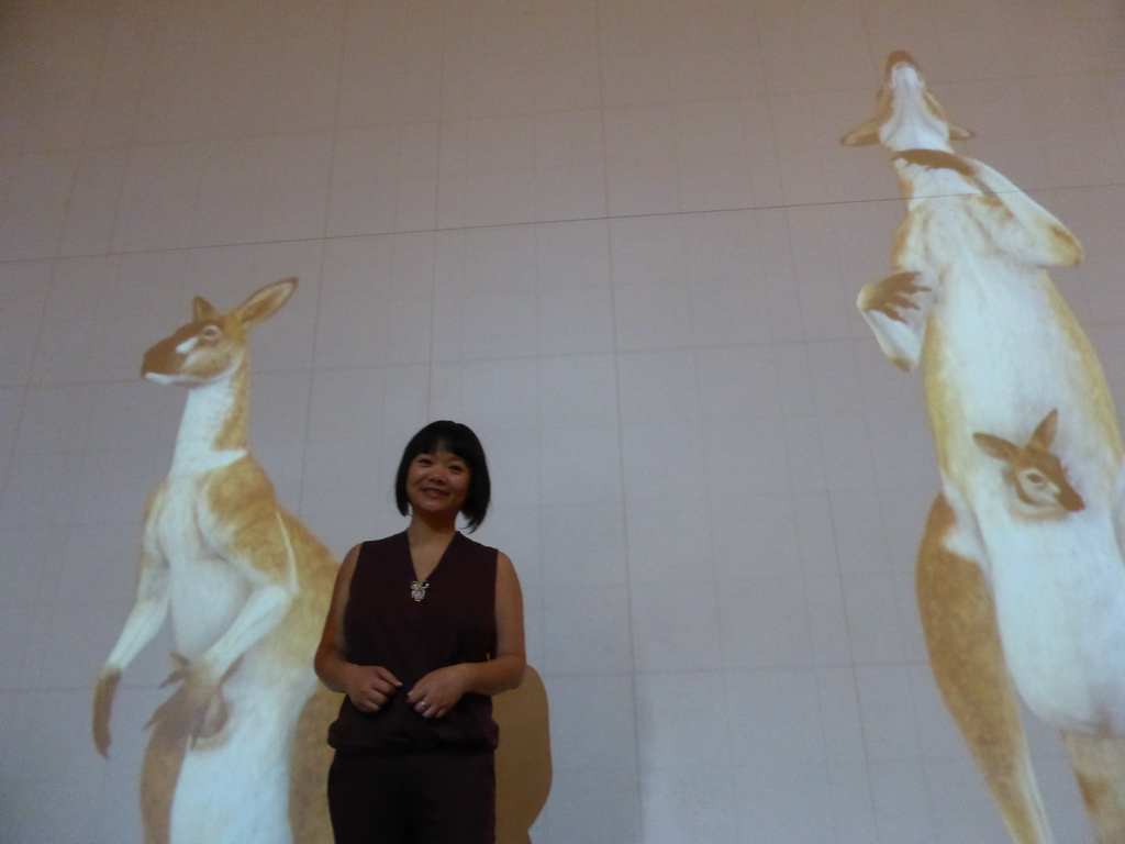 Miaomiao with a projection of Kangeroos, at the first floor of the Queensland Museum & Sciencentre