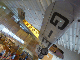 An airplane hanging above the lobby of the Queensland Museum & Sciencentre, viewed from the second floor
