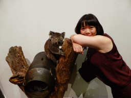 Miaomiao with a stuffed Koala, at the second floor of the Queensland Museum & Sciencentre