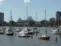 Boats and the Story Bridge over the Brisbane River, viewed from the Botanic Gardens Bikeway
