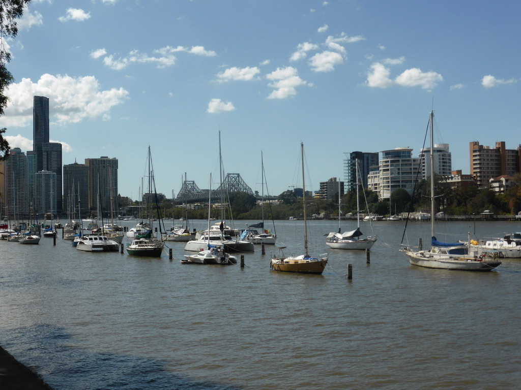 Boats, the Story Bridge over the Brisbane River and the skyline of Brisbane with the Soleil Tower, viewed from the Botanic Gardens Bikeway