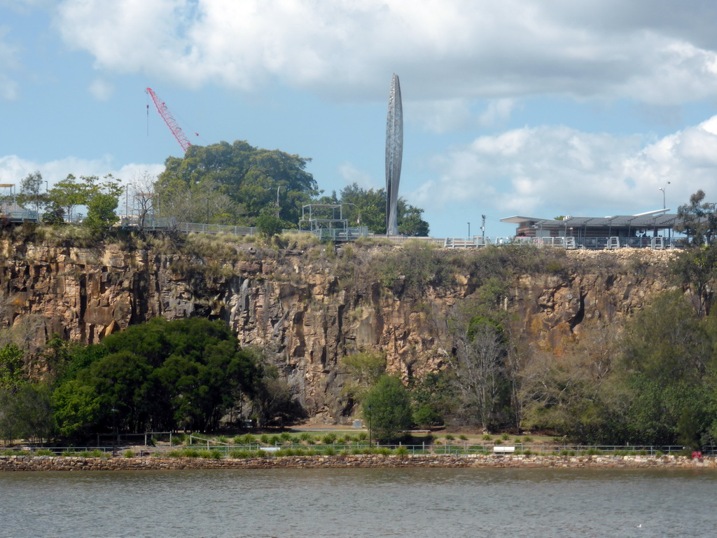 The Brisbane River and the Kangaroo Point Cliffs with the sculpture `Venus Rising: Out of the Water and into the Light` by Wolfgang Buttress, viewed from the Botanic Gardens Bikeway