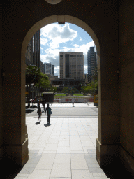 Queen Street, the Post Office Square, the Anzac Square and the Brisbane Central Railway Station, viewed through an arch in the Brisbane General Post Office
